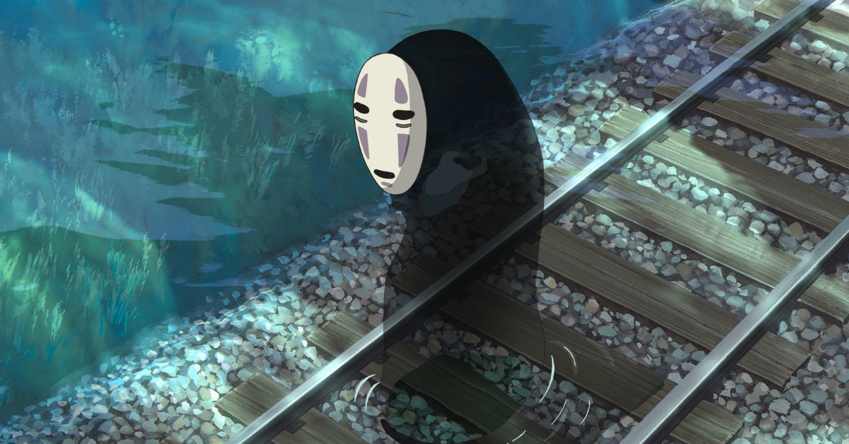 A ghostly figure walks along underwater railroad tracks. Screenshot from Hayao Miyazaki's Spirited Away.