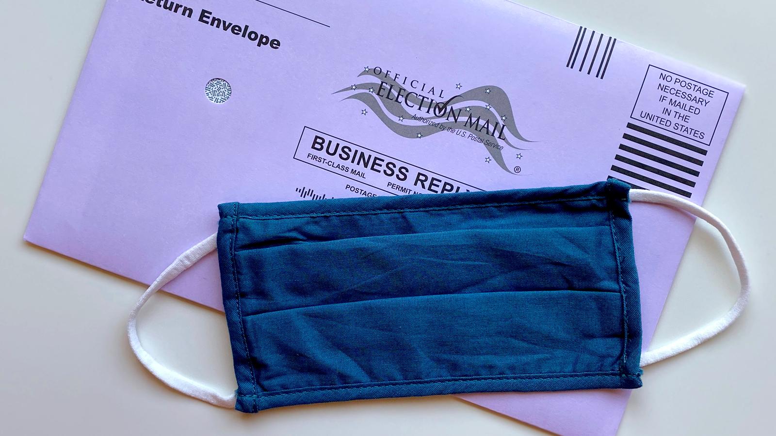 Face mask and mail-in voter ballot
